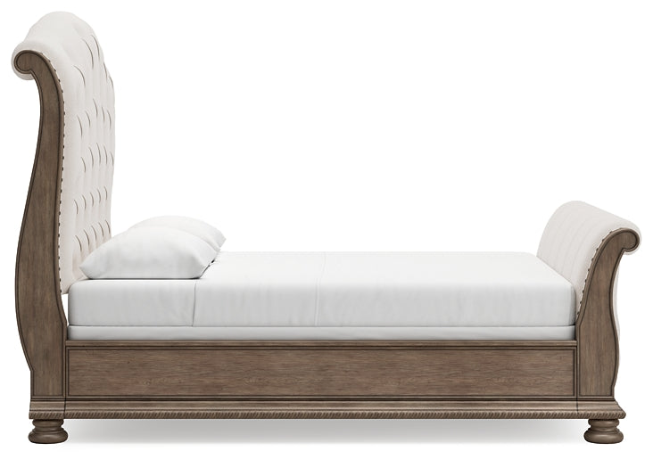 Ardenfield Queen Upholstered Sleigh Bed with Mirrored Dresser