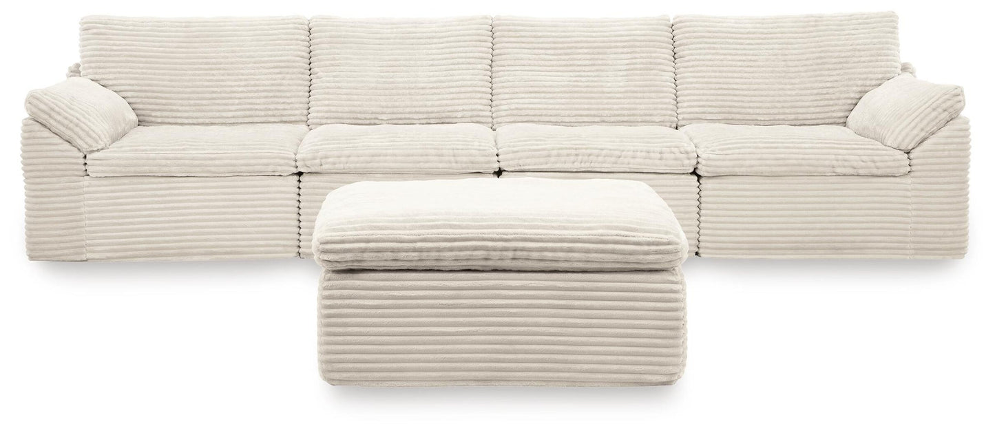 Canefield 4-Piece Sectional with Ottoman