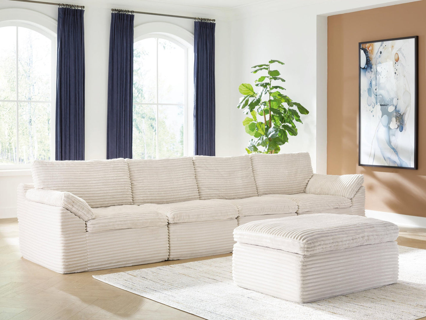 Canefield 4-Piece Sectional with Ottoman