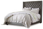 Coralayne King Upholstered Bed with Mirrored Dresser and Nightstand